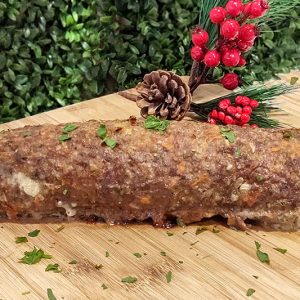 Rolo de carne recheado com queijo e ameixa